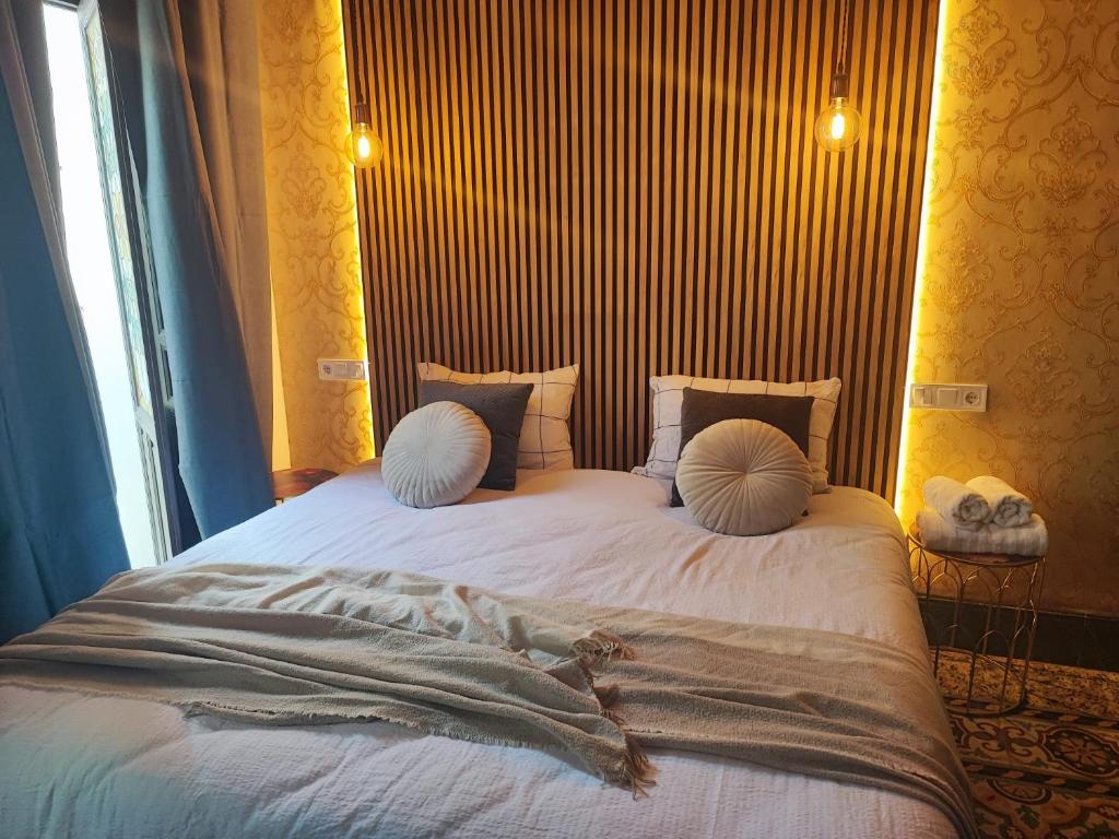 Ένα ή περισσότερα κρεβάτια σε δωμάτιο στο Luxury 16 Imperial