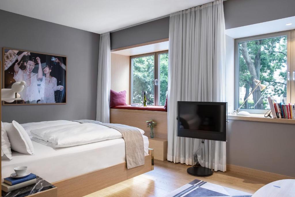 Televízia a/alebo spoločenská miestnosť v ubytovaní The Guesthouse Vienna