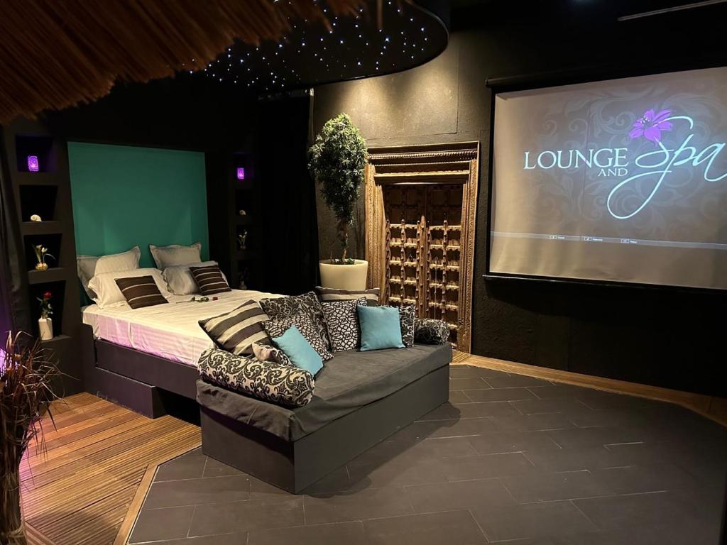 Photo de la galerie de l'établissement Nuit romantique au Lounge et Spa, à Bray-en-Val
