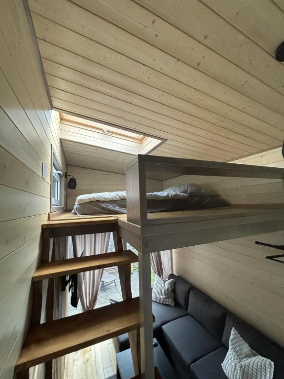 Palanda nebo palandy na pokoji v ubytování Tiny House