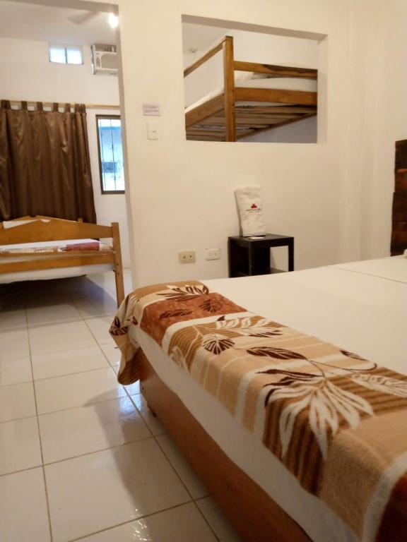 Postel nebo postele na pokoji v ubytování Bahia B&B