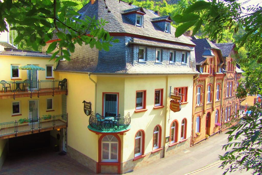 a group of buildings on a city street at Fata Morgana in Cochem