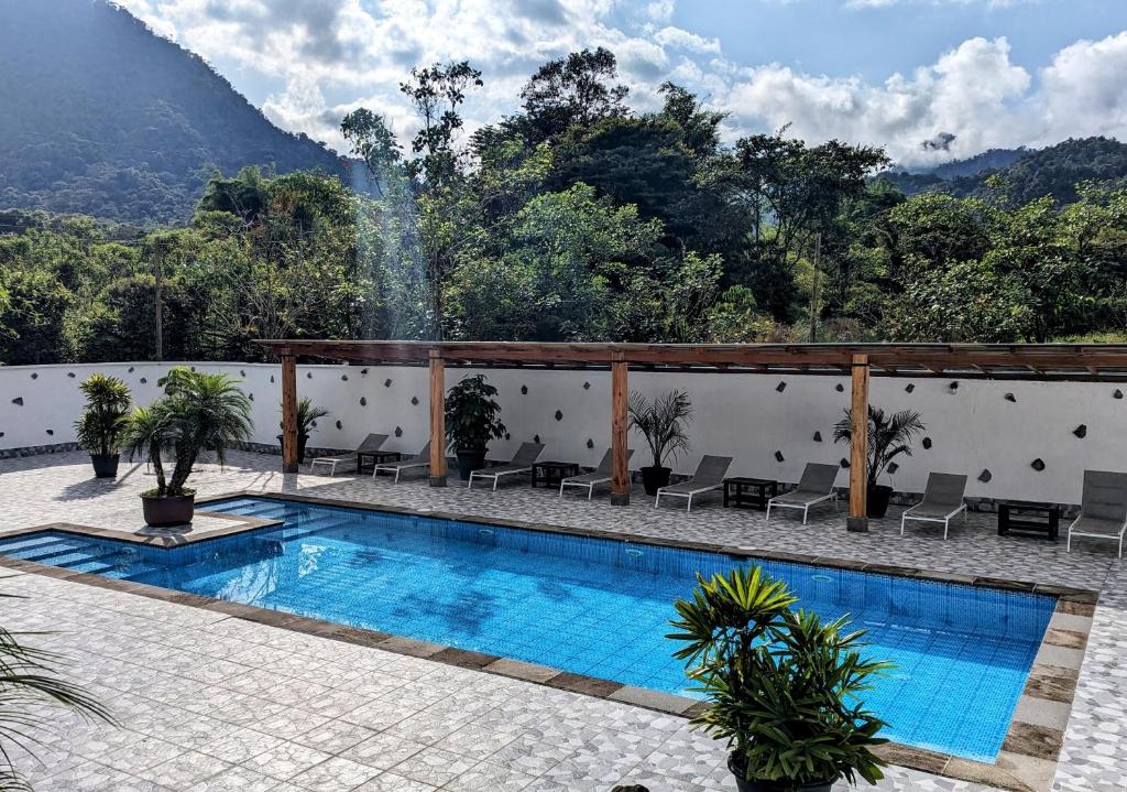 Bazén v ubytování Las Terrazas de Dana Boutique Lodge & Spa nebo v jeho okolí
