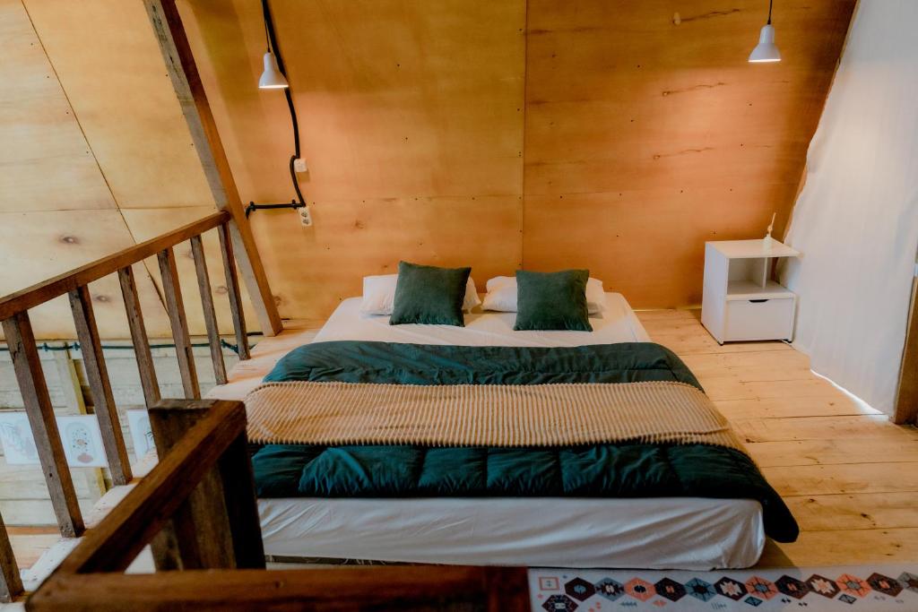 Postel nebo postele na pokoji v ubytování Satha private villa Dieng