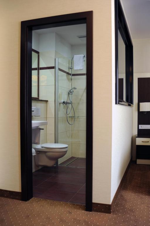 Koupelna v ubytování Hotel Atlas Halle