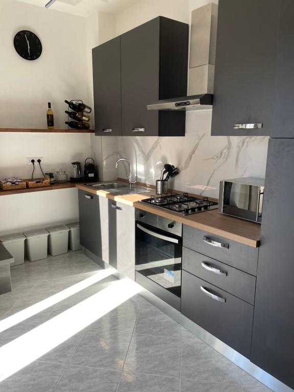 Kuchyň nebo kuchyňský kout v ubytování Civita Home Experience