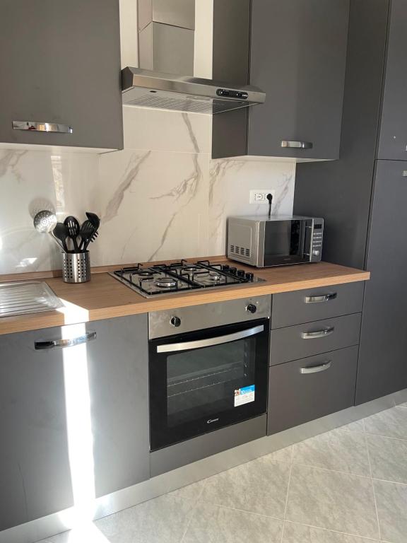 Kuchyň nebo kuchyňský kout v ubytování Civita Home Experience
