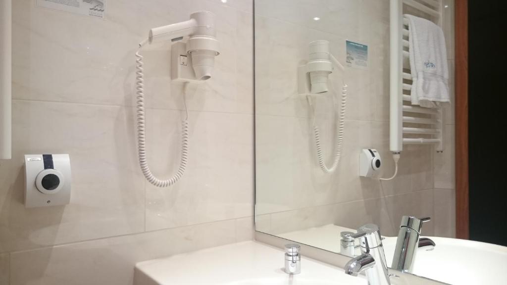 Koupelna v ubytování Hotel Avisa