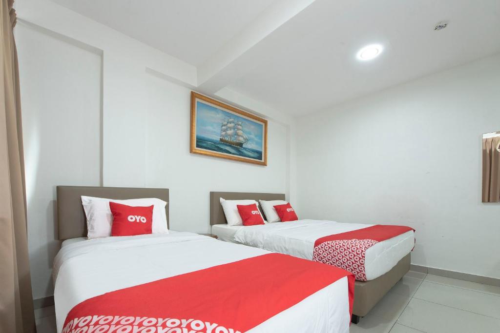 Postel nebo postele na pokoji v ubytování Sg Rengit City Resort 3