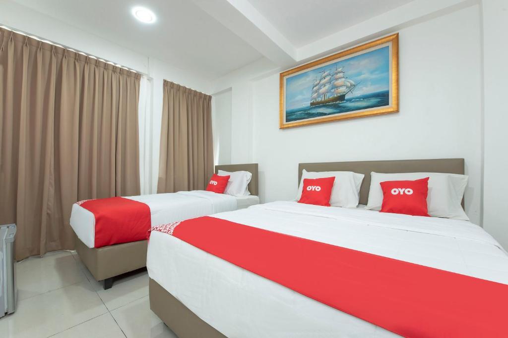 Postel nebo postele na pokoji v ubytování Sg Rengit City Resort 3