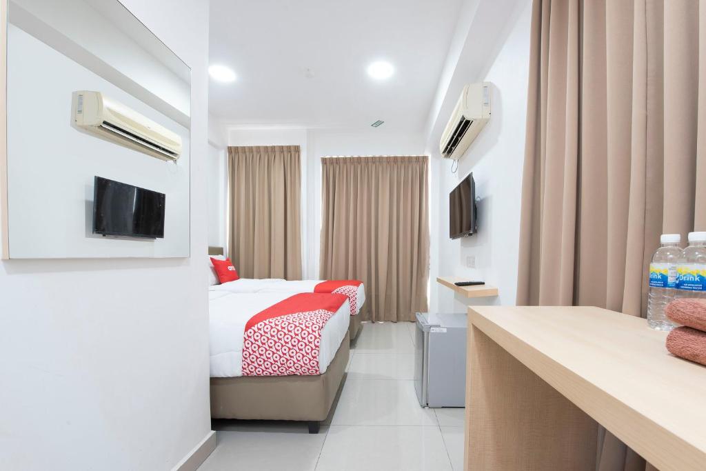 TV a/nebo společenská místnost v ubytování Sg Rengit City Resort 3