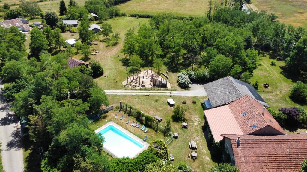 an aerial view of an estate with a pool and a house at Chambres d'Hôtes Domaine du Bourg in Gannay-sur-Loire
