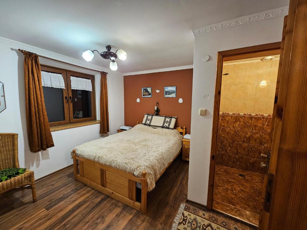 Postel nebo postele na pokoji v ubytování Hotel Rai