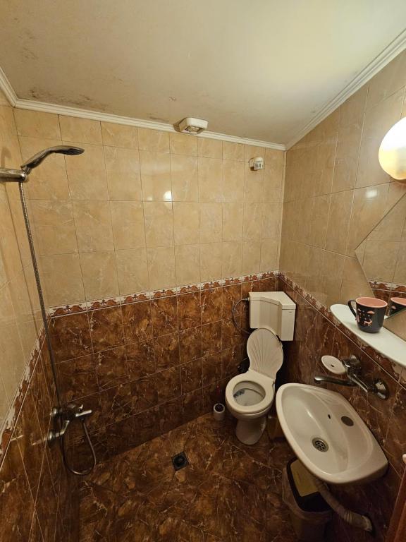 Koupelna v ubytování Hotel Rai