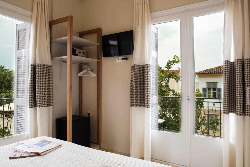 TV a/nebo společenská místnost v ubytování Athena hotel