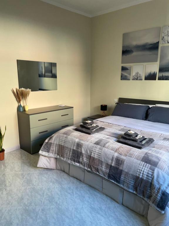 Postel nebo postele na pokoji v ubytování Civita Home Experience