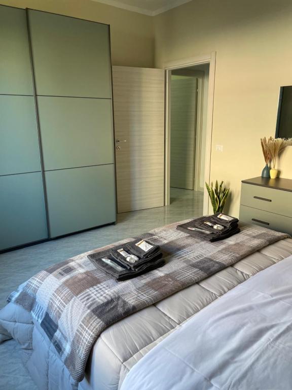 Postel nebo postele na pokoji v ubytování Civita Home Experience