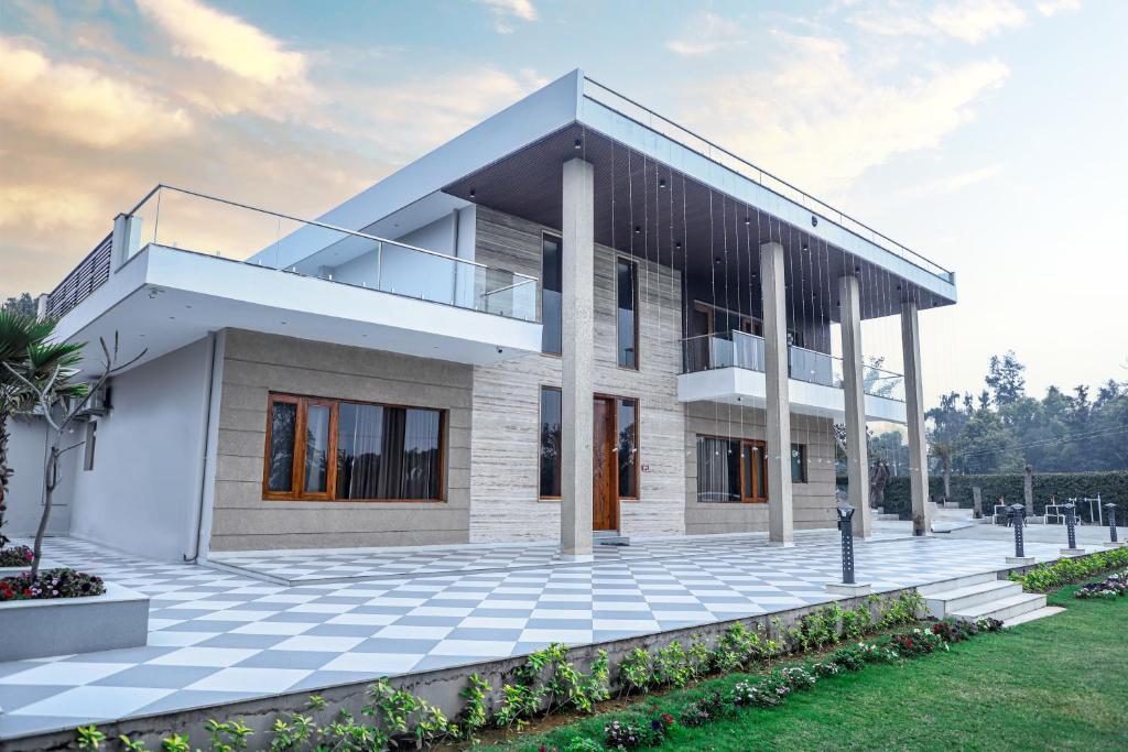 a large white house with a lot of windows at FILLOW CASA in Gurgaon