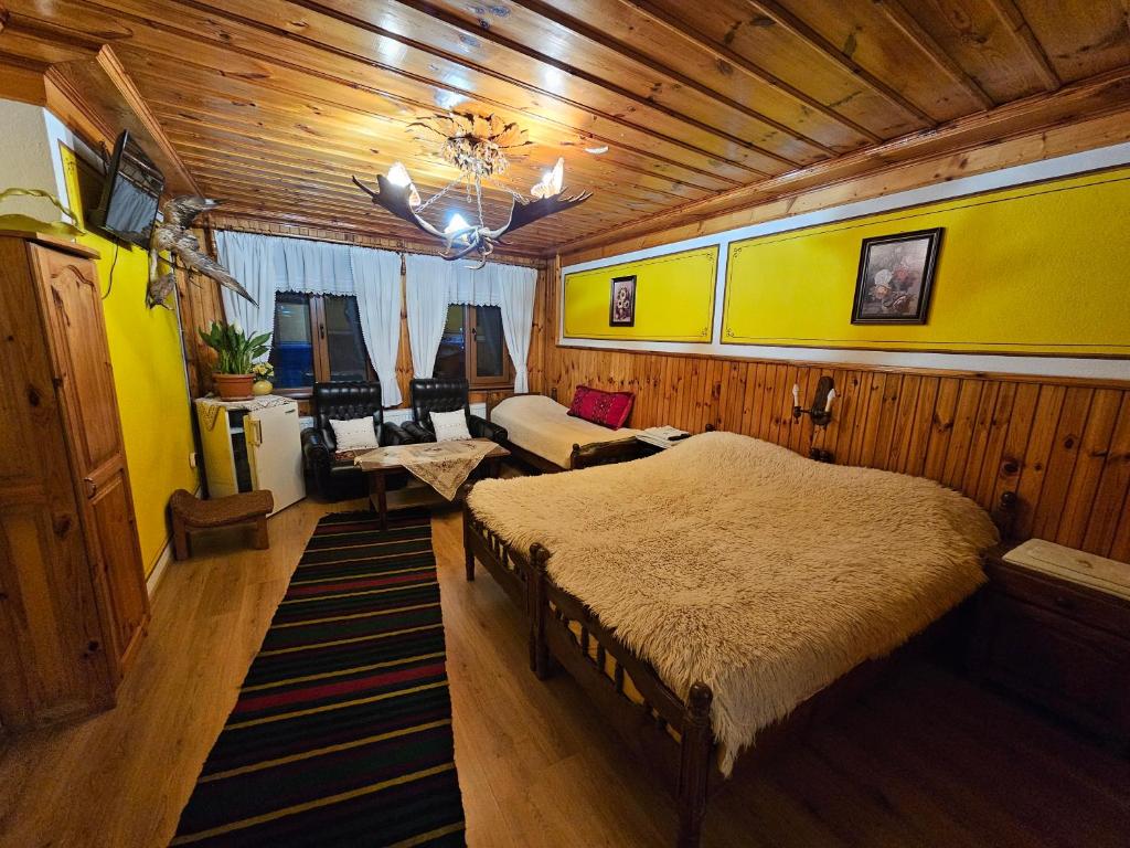Postel nebo postele na pokoji v ubytování Hotel Rai