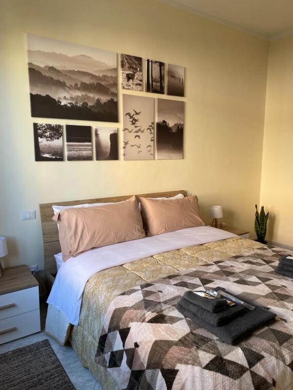 Postel nebo postele na pokoji v ubytování Civita Home Experience
