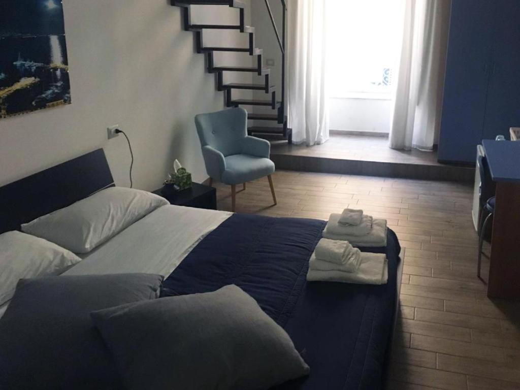 Łóżko lub łóżka w pokoju w obiekcie Home Salvator Rosa 78