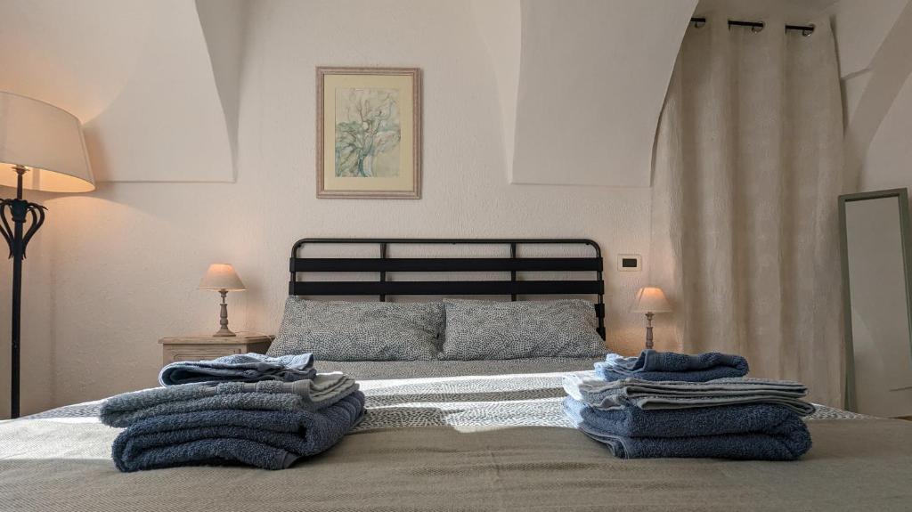 Posteľ alebo postele v izbe v ubytovaní La Casa degli Alberi