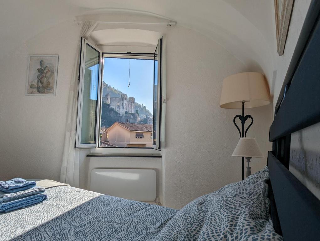 Posteľ alebo postele v izbe v ubytovaní La Casa degli Alberi