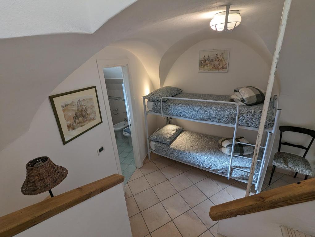 Posteľ alebo postele v izbe v ubytovaní La Casa degli Alberi