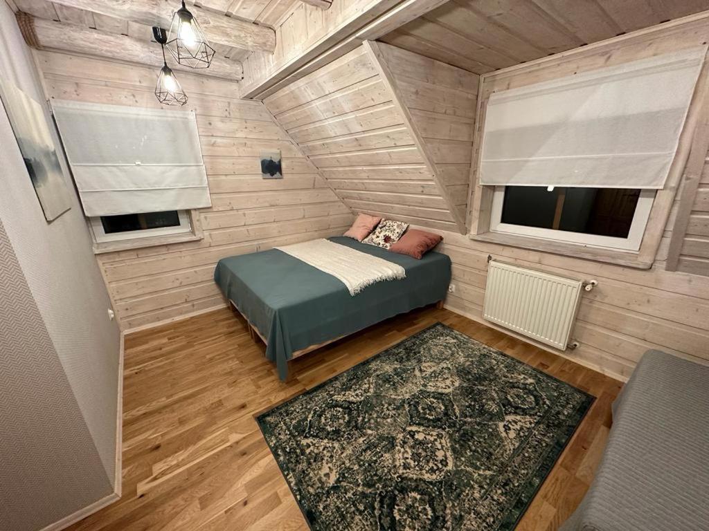 Llit o llits en una habitació de Nad Grajcarkiem