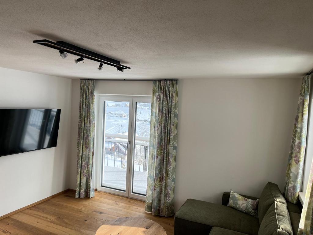 TV a/nebo společenská místnost v ubytování Apartment Tanzberger