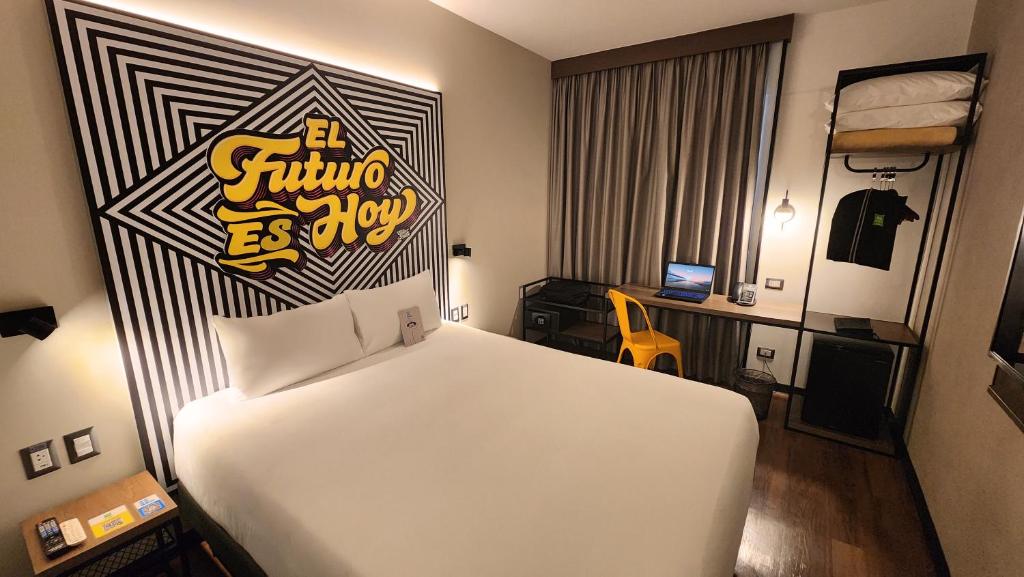 Ένα ή περισσότερα κρεβάτια σε δωμάτιο στο ibis styles Lima San Isidro