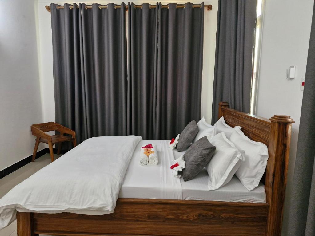 Postel nebo postele na pokoji v ubytování 64 ZENJ HOUSE Luxury AIRPORT HOTEL