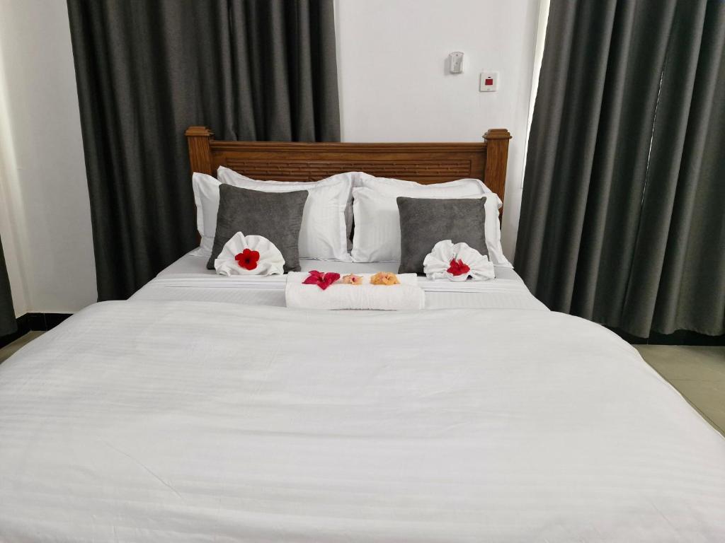 Postel nebo postele na pokoji v ubytování 64 ZENJ HOUSE Luxury AIRPORT HOTEL