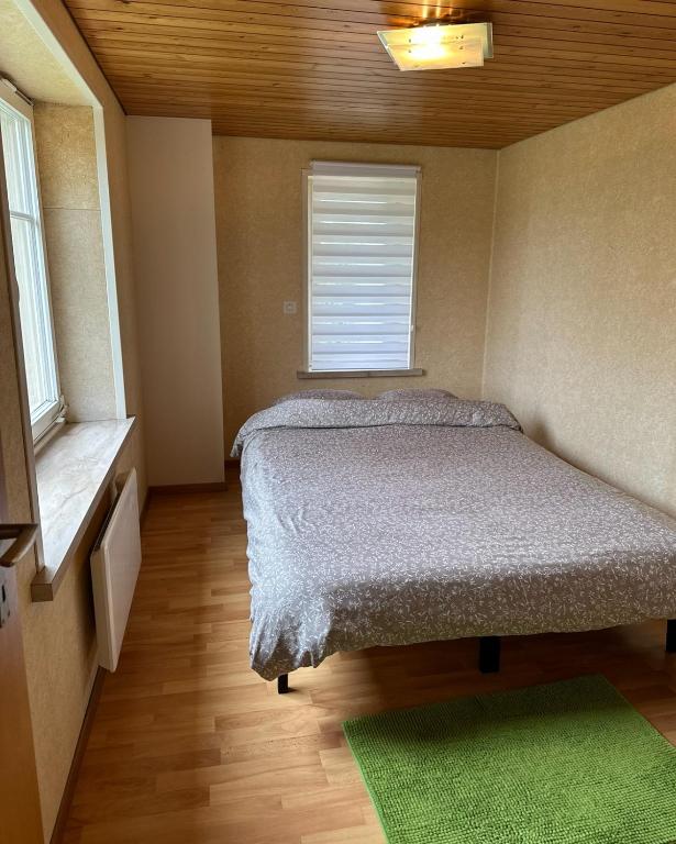 Postel nebo postele na pokoji v ubytování Bom descanso