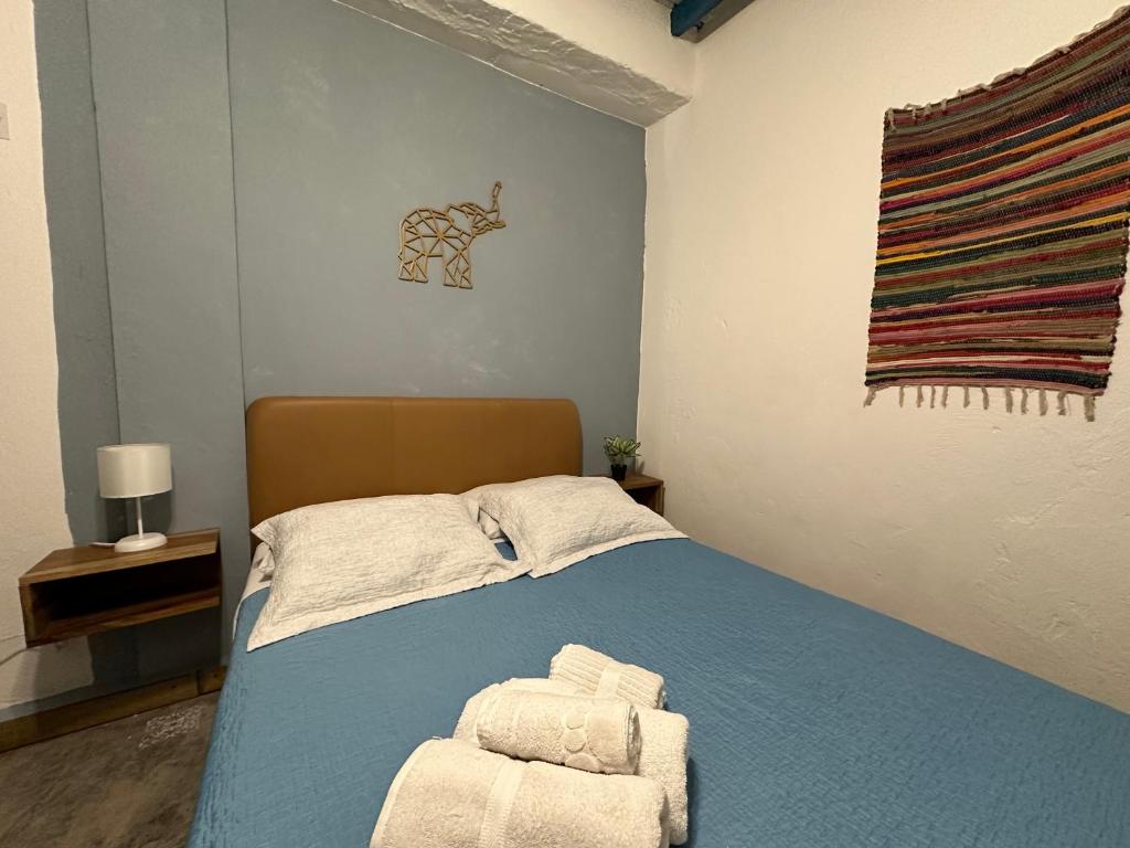 Postel nebo postele na pokoji v ubytování Hotel Casa Lucca