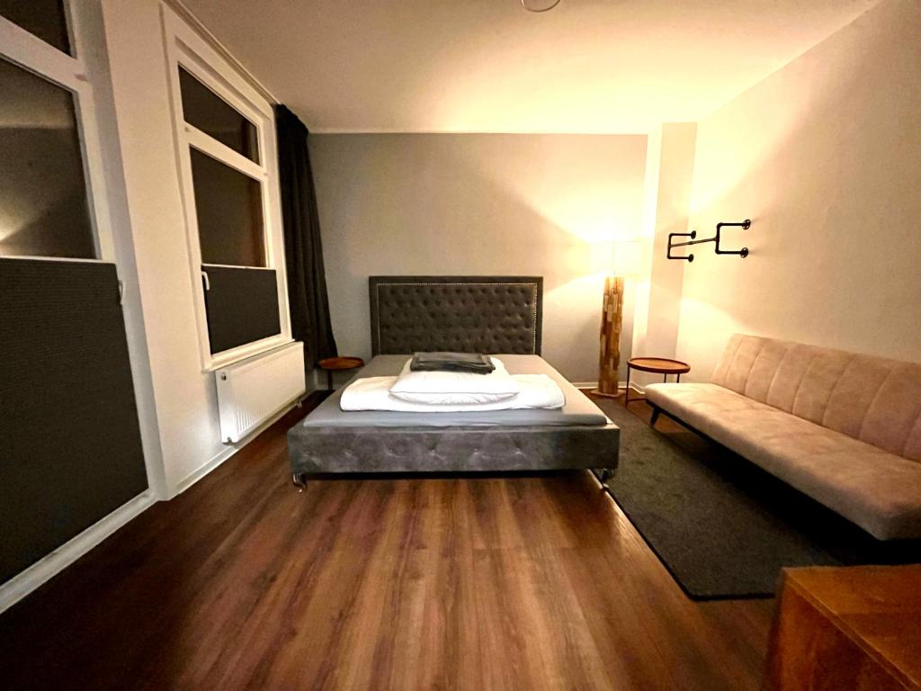 Postel nebo postele na pokoji v ubytování Stadtmitte im Zentrum von Itzehoe