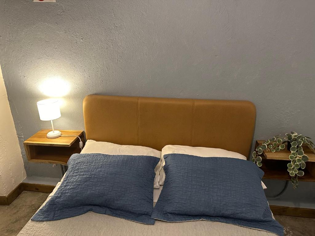 Postel nebo postele na pokoji v ubytování Hotel Casa Lucca