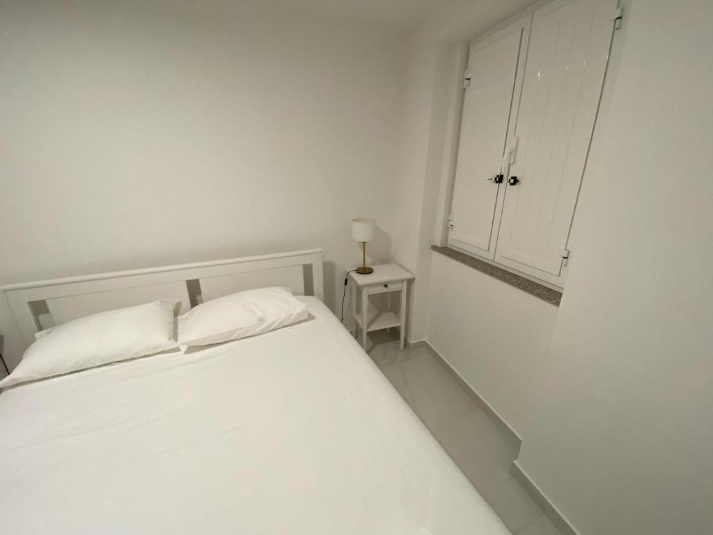 Ένα ή περισσότερα κρεβάτια σε δωμάτιο στο Casa Bossa Nova