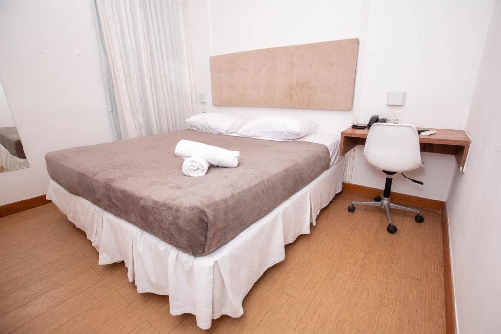 Postel nebo postele na pokoji v ubytování Rede Andrade Express