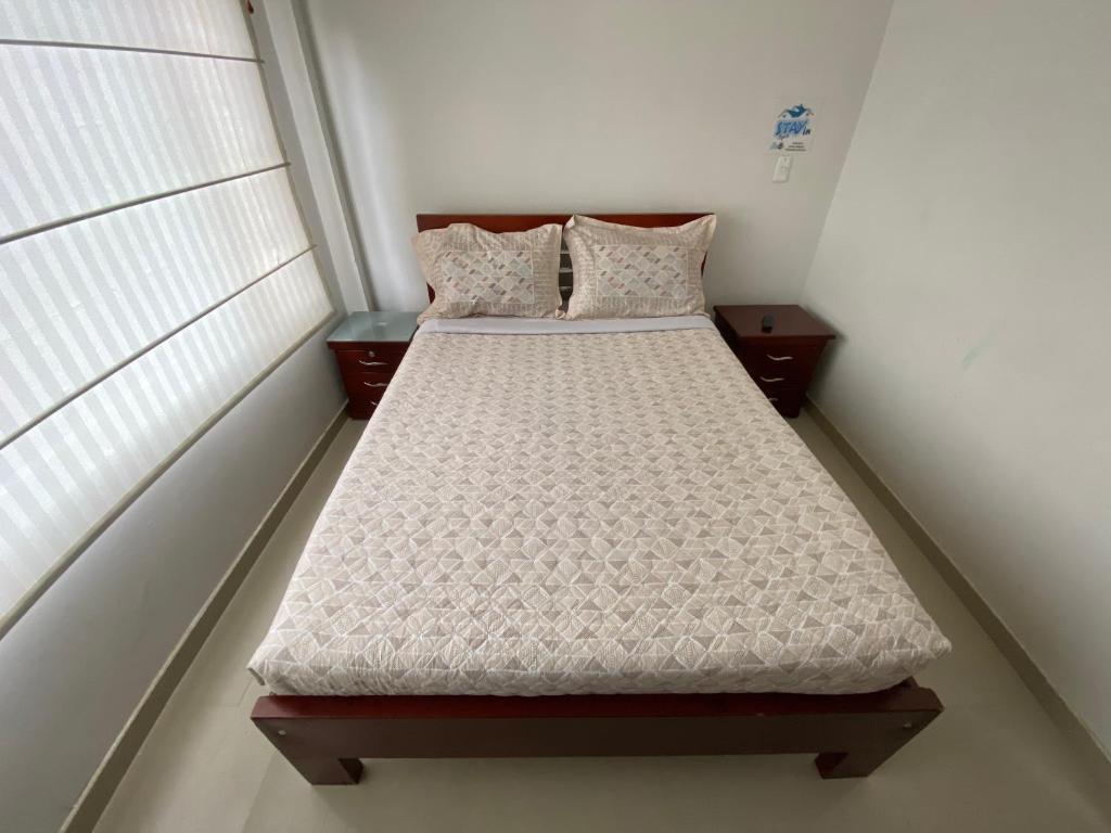 Postel nebo postele na pokoji v ubytování Stay In Bogota