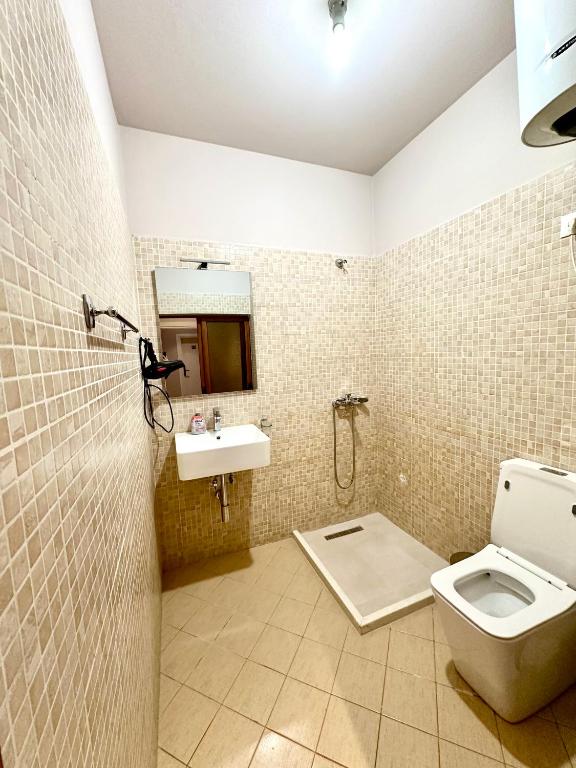 Koupelna v ubytování HOTEL NOBEL CENTER