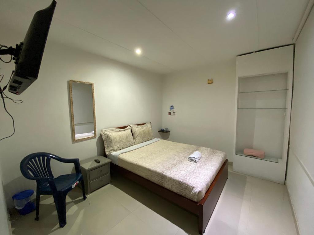 Postel nebo postele na pokoji v ubytování Stay In Bogota