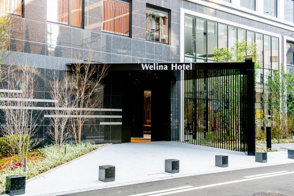 大阪市にあるWelina Hotel Premier Osaka Nambaのウィチタホテル入口付きの建物