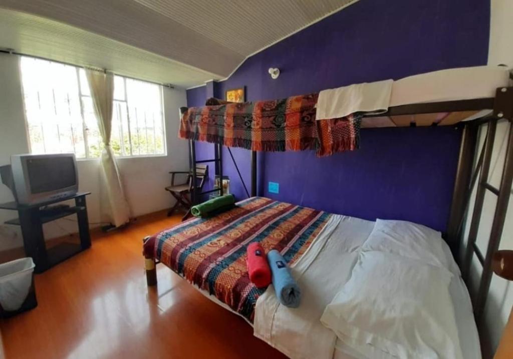 Postel nebo postele na pokoji v ubytování ZIPA HOSTEL