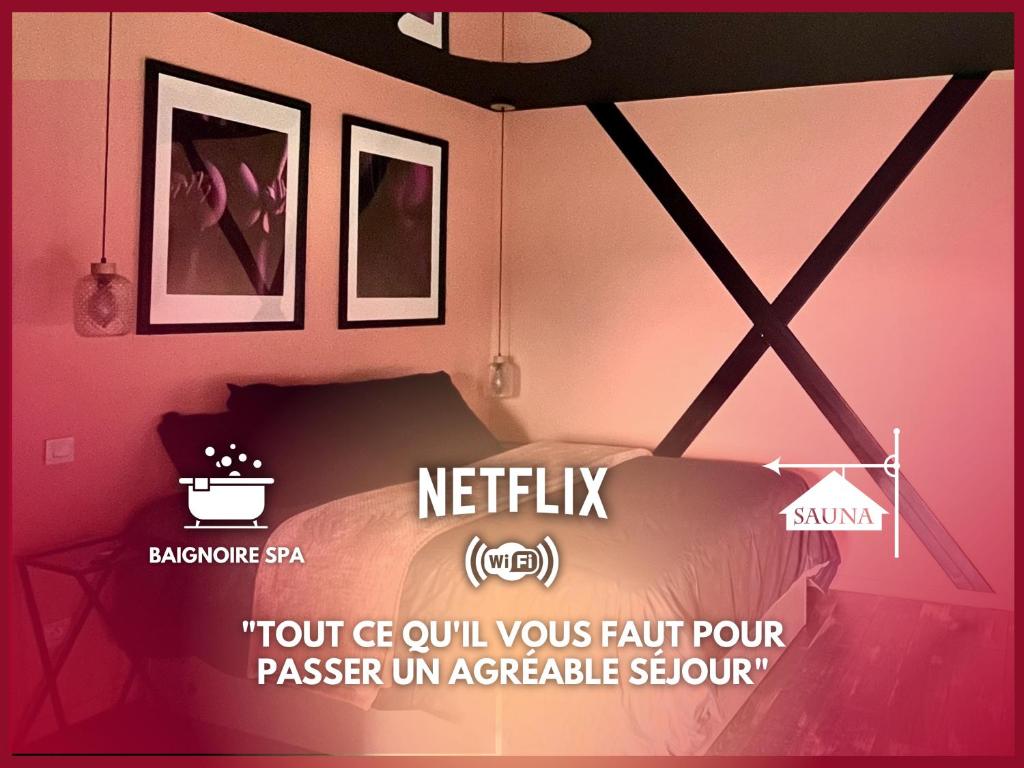 a bedroom with a bed with a sign on it at 03 LOVE ROOM By Fanny S in Saint-Quentin