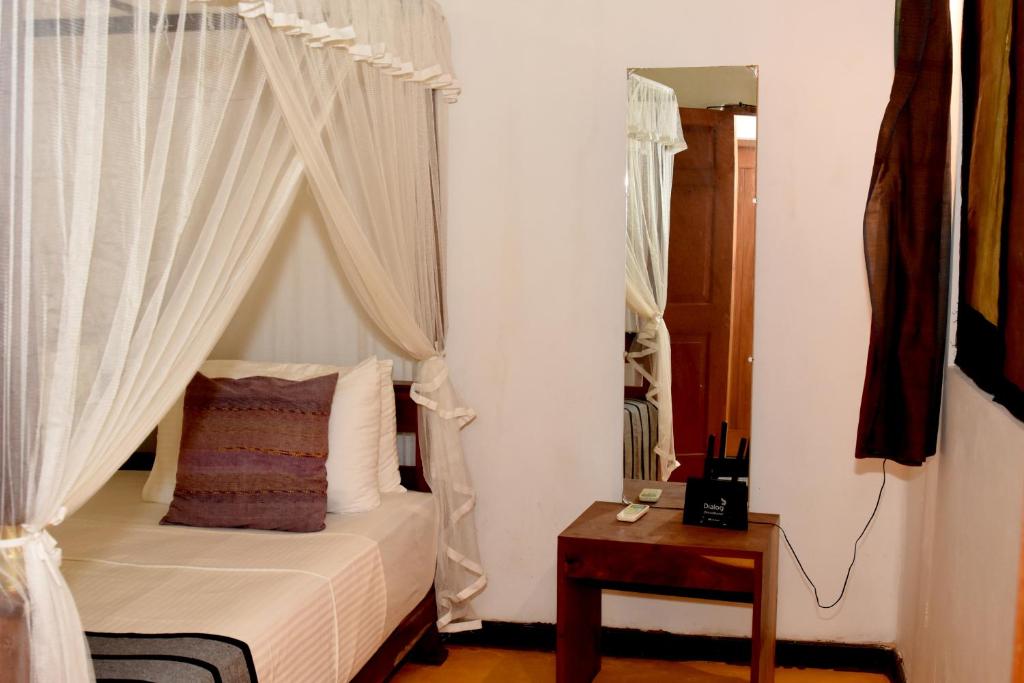 Postel nebo postele na pokoji v ubytování Villa Polhena