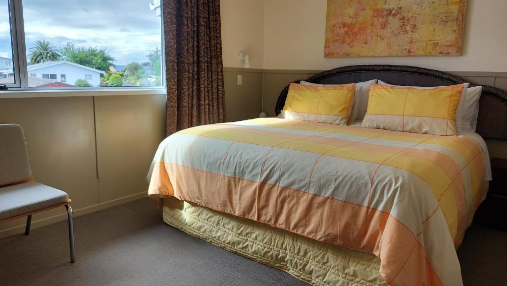 Postel nebo postele na pokoji v ubytování Bed and Breakfast Happy Home Taupo Accommodation