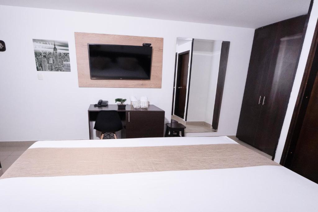 Cama o camas de una habitación en Sixth House Suite