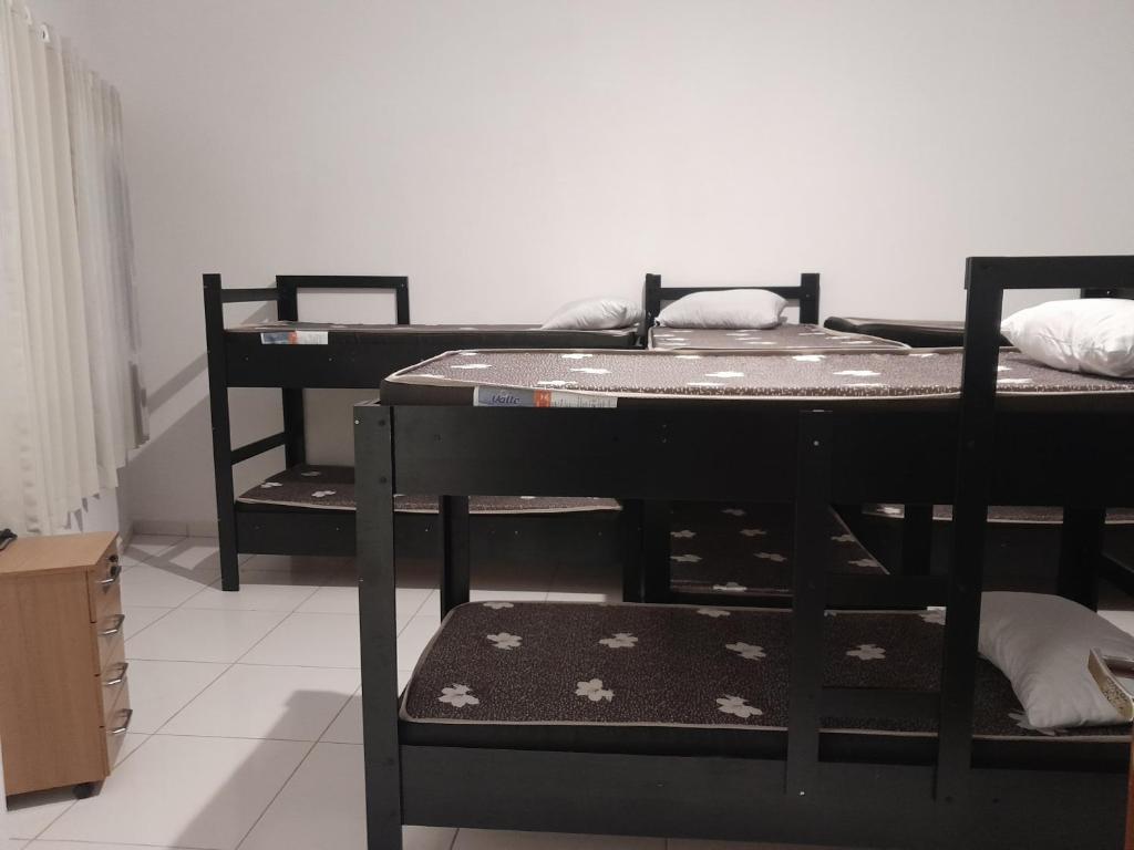 Postel nebo postele na pokoji v ubytování Pé na areia Casarão do Morcego