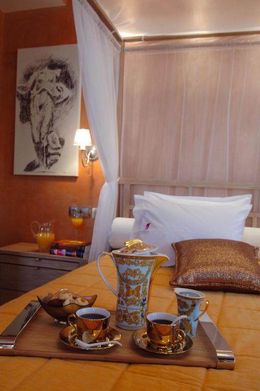 Posteľ alebo postele v izbe v ubytovaní Olympic Fashion Hotels